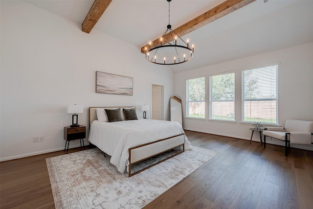 bedroom with an inviting chandelier, dark wood-type flooring, vaulted ceiling with beams, and baseboards