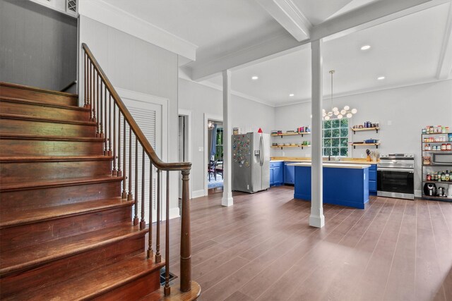 staircase featuring beam ceiling, recessed lighting, wood finished floors, and crown molding