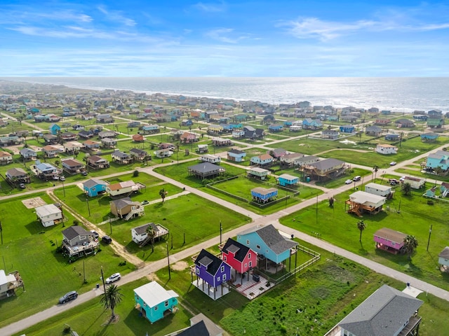 drone / aerial view with a residential view and a water view