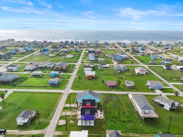 bird's eye view featuring a residential view and a water view