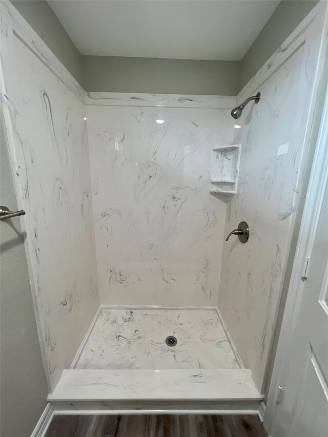 511 Caisson St, Surfside Beach, TX 77541 - bathroom featuring a marble finish shower