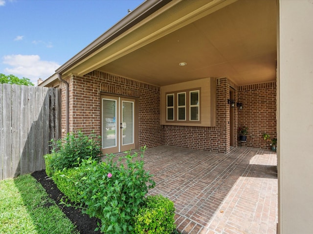 view of patio / terrace featuring fence