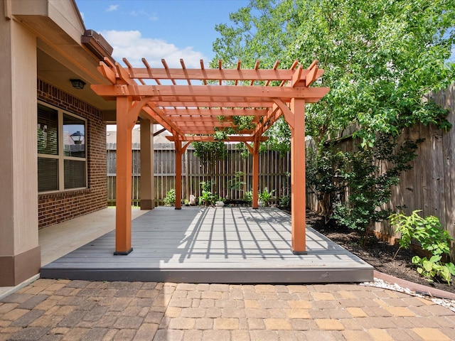 view of patio / terrace featuring a fenced backyard, a pergola, and a deck