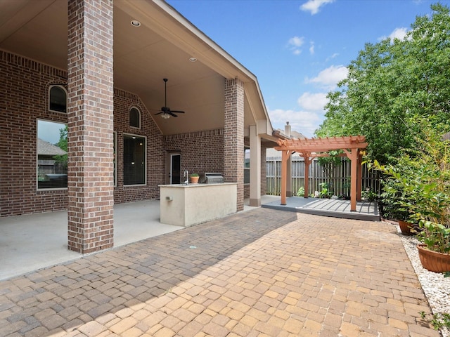 view of patio / terrace featuring ceiling fan, fence, a pergola, and area for grilling