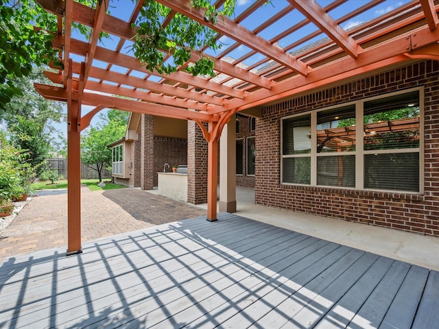 view of patio featuring fence and a pergola