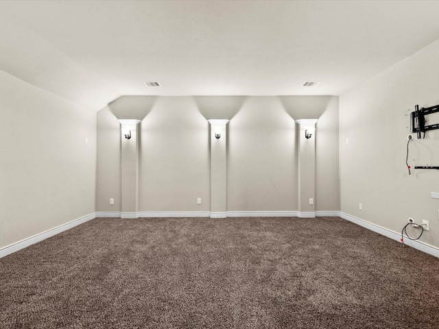 bonus room featuring carpet floors, baseboards, lofted ceiling, and visible vents