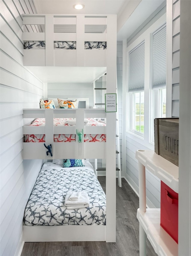 bathroom featuring wood finished floors and baseboards