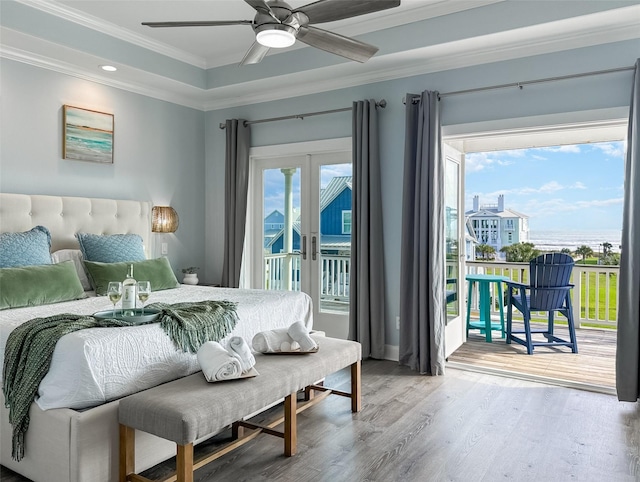 bedroom with ceiling fan, recessed lighting, ornamental molding, wood finished floors, and access to outside
