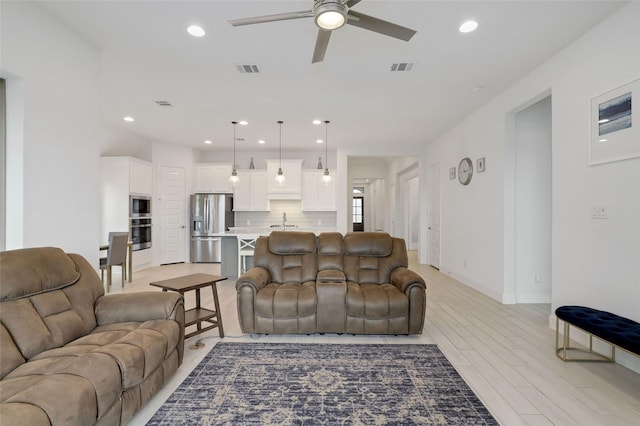 20514 Yearling Pasture Ln, Tomball, TX 77377 - living room with a ceiling fan, light wood-style floors, and recessed lighting