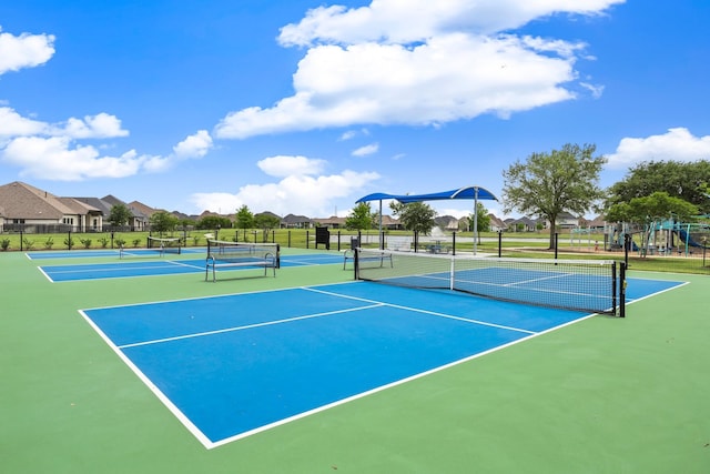 view of sport court with community basketball court and fence