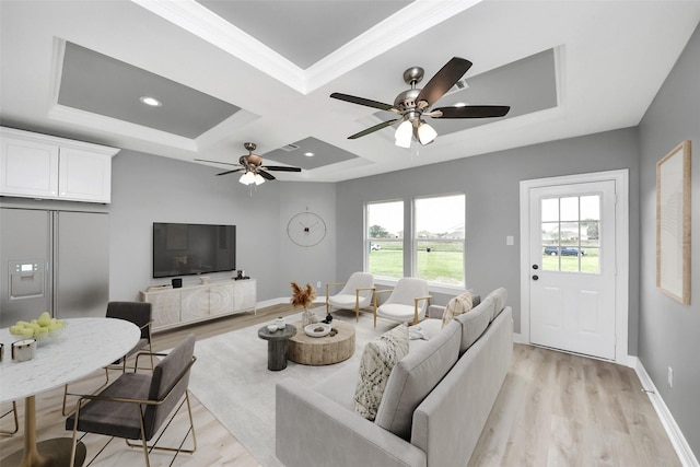 3527 Brook Valley Dr, Brookshire, TX 77423 - living area with light wood-style flooring, a ceiling fan, coffered ceiling, baseboards, and crown molding