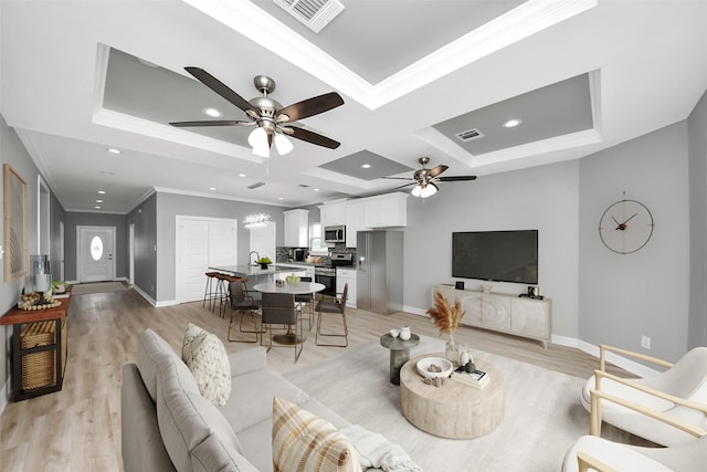 3527 Brook Valley Dr, Brookshire, TX 77423 - living area with ceiling fan, baseboards, crown molding, light wood-type flooring, and recessed lighting