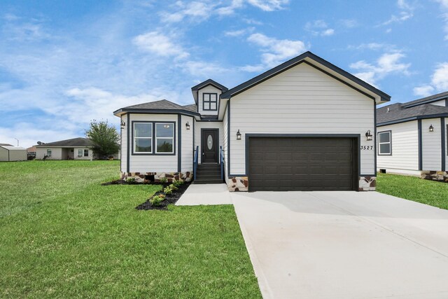 3527 Brook Valley Dr, Brookshire, TX 77423 - ranch-style home with driveway, an attached garage, and a front yard