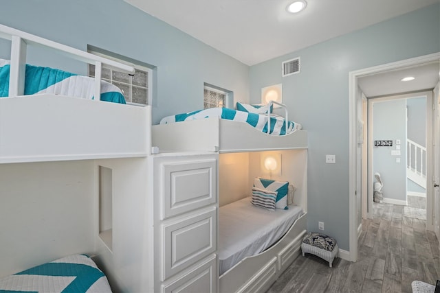 19427 Shores Dr, Galveston, TX 77554 - bedroom featuring baseboards, visible vents, wood finished floors, and recessed lighting