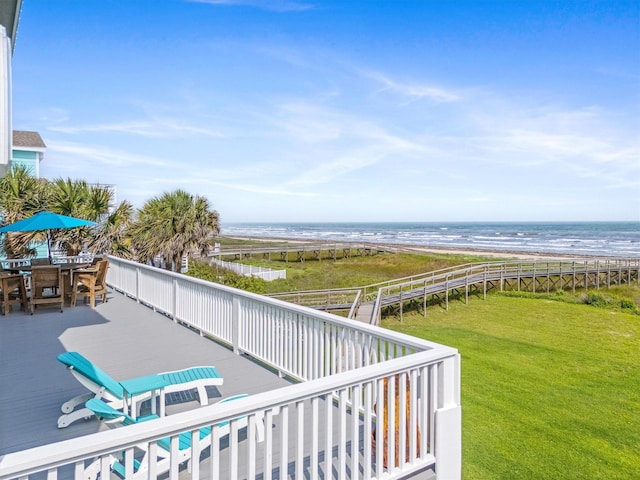 19427 Shores Dr, Galveston, TX 77554 - exterior space featuring a view of the beach, outdoor dining area, and a deck with water view