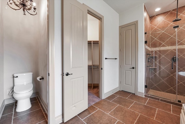 full bath with tile patterned flooring, toilet, recessed lighting, baseboards, and a stall shower