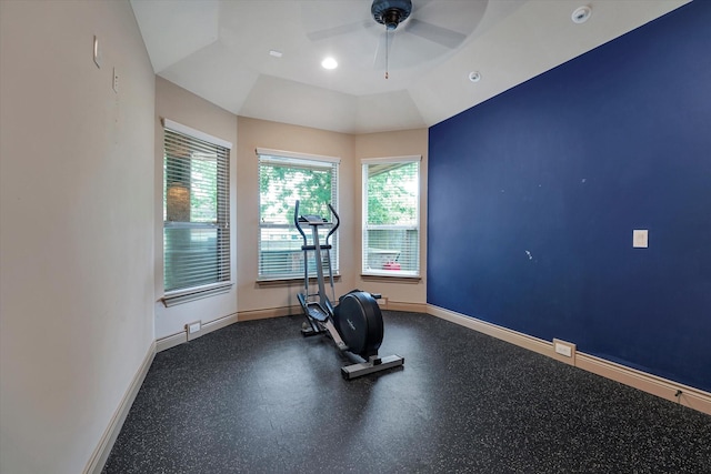 exercise area with baseboards, a ceiling fan, and a healthy amount of sunlight