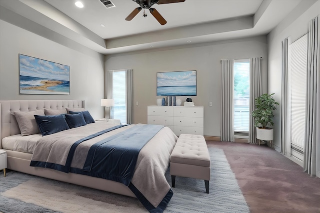 46 Chestnut Meadow Dr, Conroe, TX 77384 - carpeted bedroom with a tray ceiling, recessed lighting, and ceiling fan