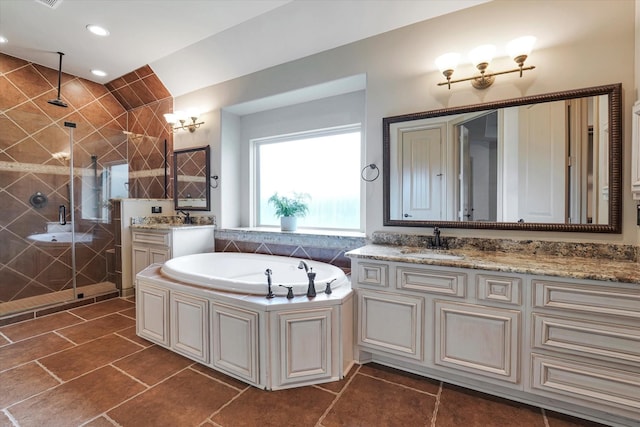 full bathroom with a bath, a stall shower, vanity, tile patterned floors, and recessed lighting