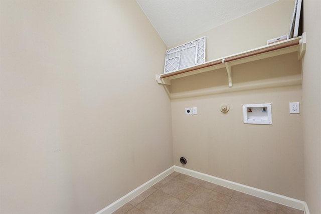 3635 Sunlight Hill Ln, Spring, TX 77386 - clothes washing area featuring hookup for an electric dryer, light tile patterned floors, washer hookup, laundry area, and baseboards