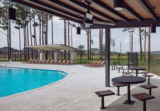 7707 Basil Ridge Dr, Cypress, TX 77433 - community pool featuring fence and a patio