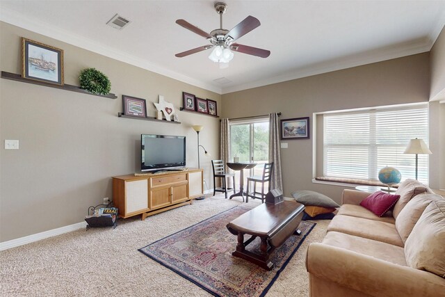 13671 Suzanne Pl, College Station, TX 77845 - living area with a ceiling fan, visible vents, baseboards, ornamental molding, and light colored carpet