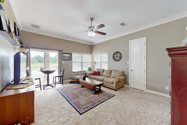 13671 Suzanne Pl, College Station, TX 77845 - carpeted living area with ceiling fan, crown molding, visible vents, and baseboards