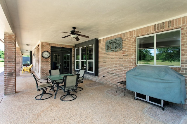 13671 Suzanne Pl, College Station, TX 77845 - view of patio / terrace with outdoor dining space, ceiling fan, area for grilling, and french doors