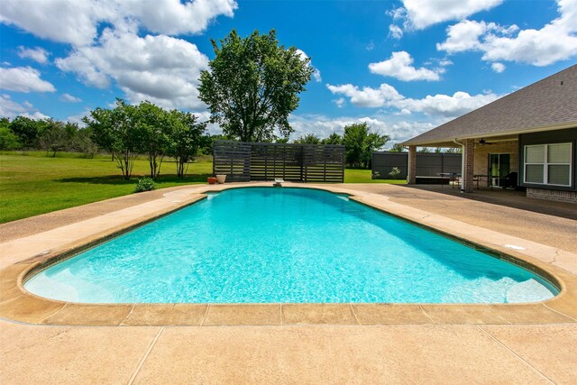 13671 Suzanne Pl, College Station, TX 77845 - view of swimming pool with a fenced in pool, a patio area, ceiling fan, fence, and a yard