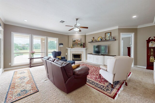 13671 Suzanne Pl, College Station, TX 77845 - living area featuring ceiling fan, a tile fireplace, light colored carpet, and recessed lighting