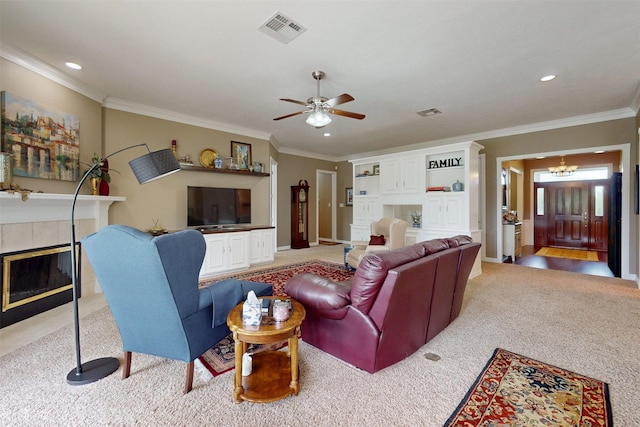 13671 Suzanne Pl, College Station, TX 77845 - living area featuring a fireplace, crown molding, visible vents, carpet, and ceiling fan with notable chandelier