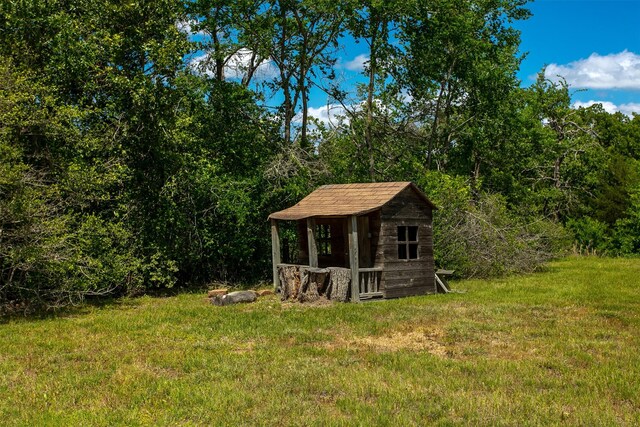 13671 Suzanne Pl, College Station, TX 77845 - view of yard featuring an outdoor structure
