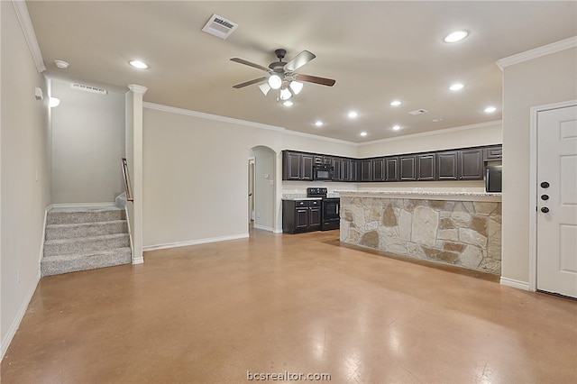 unfurnished living room with arched walkways, ornamental molding, ceiling fan, baseboards, and visible vents