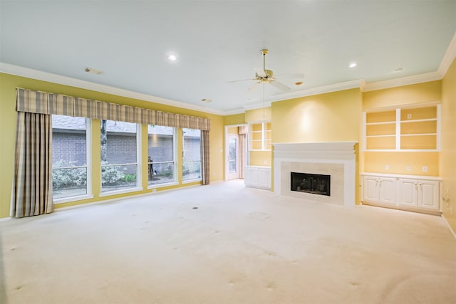 13727 Aspen Cove Dr, Houston, TX 77077 - unfurnished living room with ornamental molding, a tiled fireplace, ceiling fan, carpet, and recessed lighting