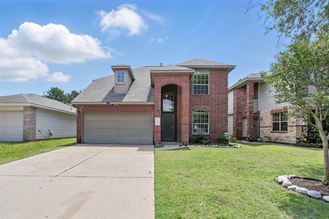 20018 Stonepine Creek Dr, Tomball, TX 77375 - traditional home with brick siding, a front yard, a garage, and concrete driveway