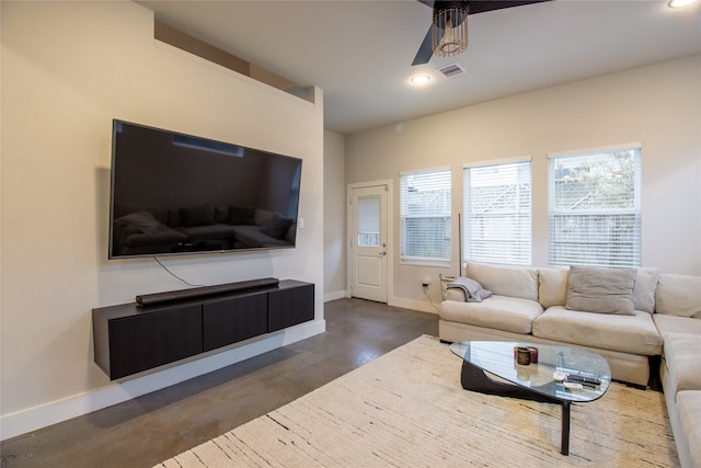 living room with recessed lighting, a ceiling fan, visible vents, and baseboards