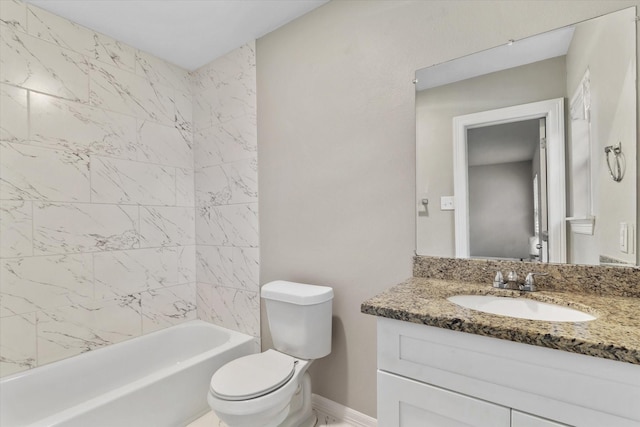 full bathroom featuring toilet, baseboards, vanity, and shower / bathing tub combination