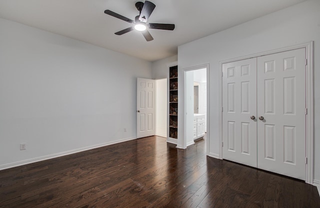 7203 W Hearthstone Green Dr, Houston, TX 77095 - unfurnished bedroom featuring dark wood finished floors, baseboards, a closet, and ceiling fan