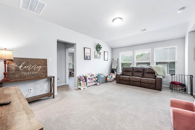 carpeted living room featuring baseboards and visible vents