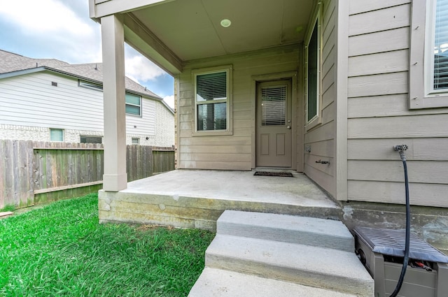 property entrance with fence