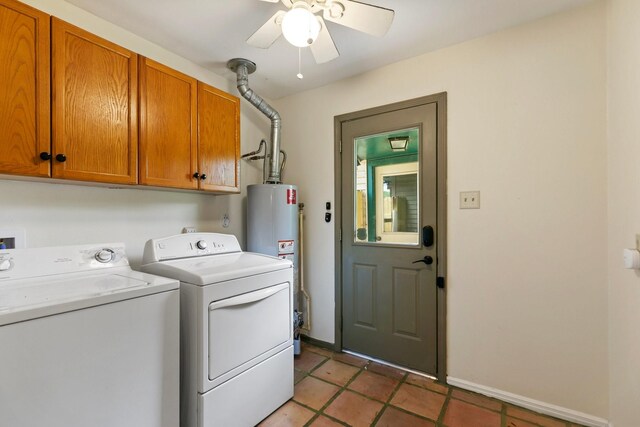laundry room with cabinet space, ceiling fan, water heater, baseboards, and washer and clothes dryer