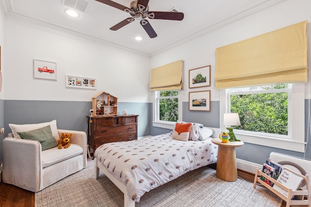 1202 Ashland St, Houston, TX 77008 - bedroom featuring wood finished floors, ornamental molding, recessed lighting, ceiling fan, and baseboards