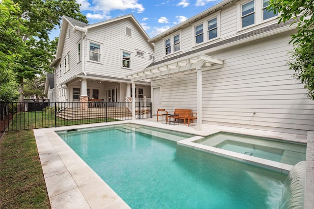 1202 Ashland St, Houston, TX 77008 - rear view of property featuring a pergola, a patio area, and a pool with connected hot tub