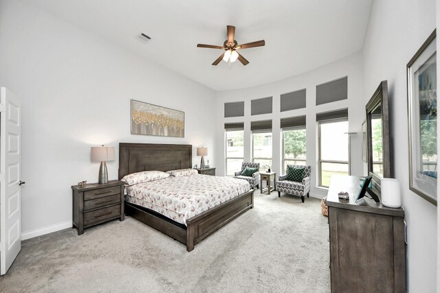 2242 Bayleaf Manor Dr, Manvel, TX 77578 - carpeted bedroom with visible vents, a ceiling fan, baseboards, and multiple windows
