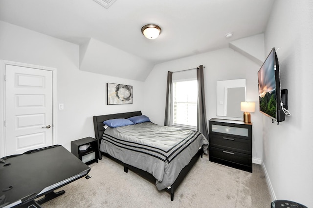 2242 Bayleaf Manor Dr, Manvel, TX 77578 - bedroom with light colored carpet, baseboards, vaulted ceiling, and visible vents
