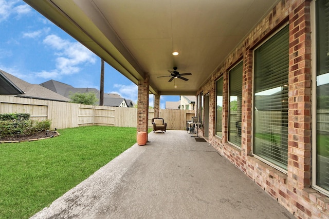 2242 Bayleaf Manor Dr, Manvel, TX 77578 - view of patio / terrace featuring a fenced backyard and a ceiling fan