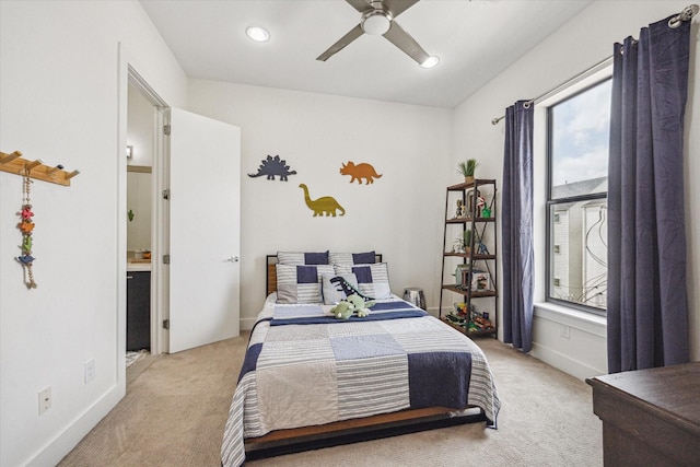 bedroom featuring connected bathroom, light colored carpet, baseboards, recessed lighting, and a ceiling fan