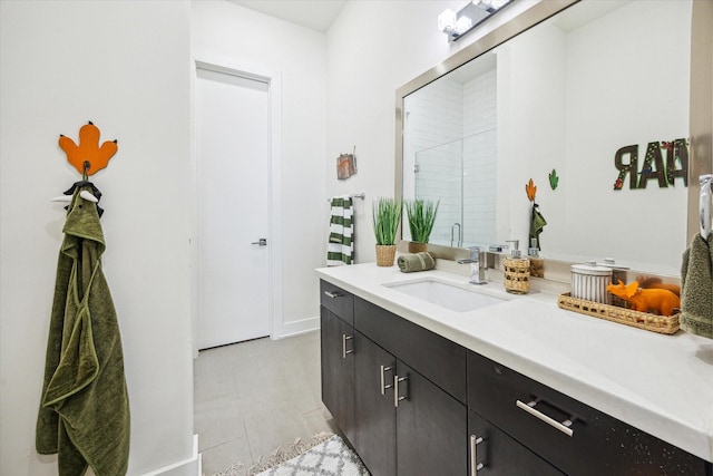 1505 Detering St, Houston, TX 77007 - bathroom with vanity, a shower stall, tile patterned flooring, and baseboards