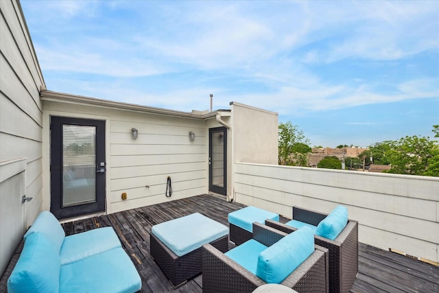 wooden deck with outdoor lounge area