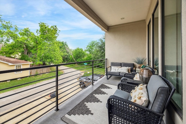 balcony with an outdoor hangout area